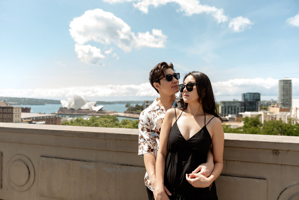 Close up of couple holding hands showing jewellery and outfit detail, Sydney couples photography by Carolina Morgan